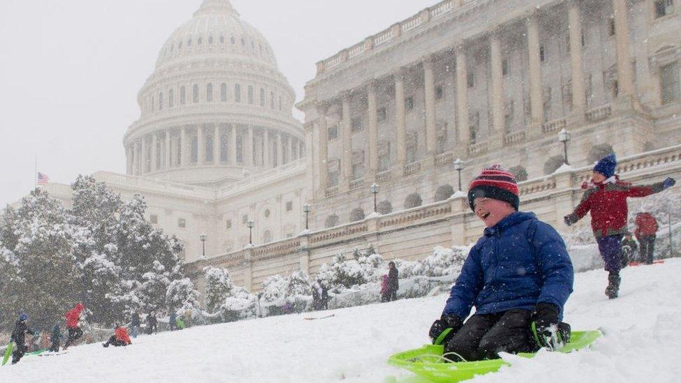 Sledgers enjoy cancelled classes on Washington's Capitol Hill, home of the US Congress