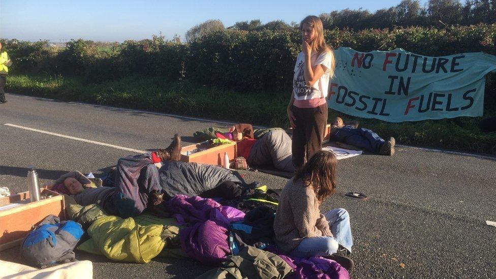 Protesters outside the refinery