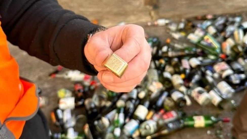 Bottle bank gold ring