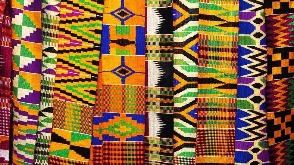 Kente cloth is display in eastern Ghana, May 13, 2004.