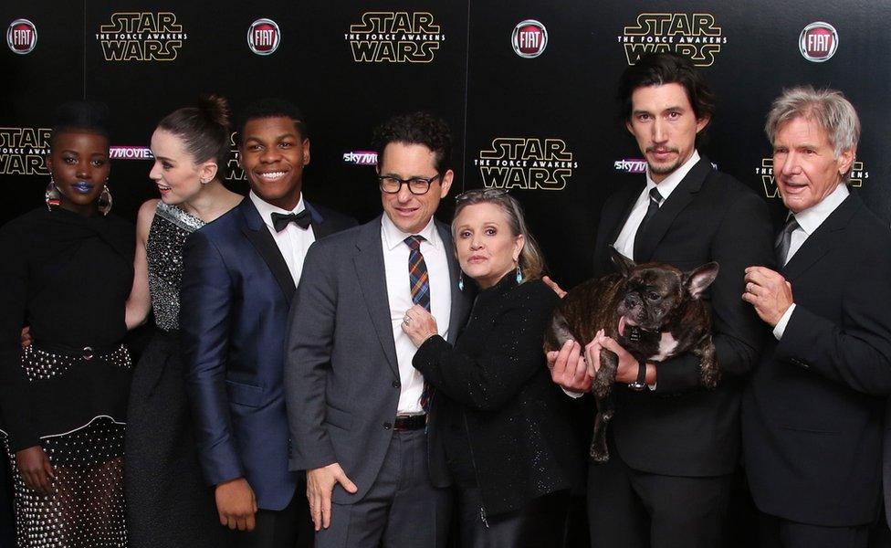 (from left) Lupita Nyong'o, Daisy Ridley, John Boyega, JJ Abrams, Carrie Fisher, Adam Driver and Harrison Ford