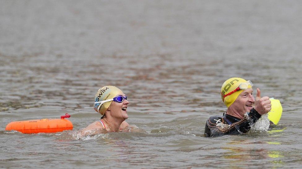 David and Karen Quartermain swimming in the Bristol Harbour