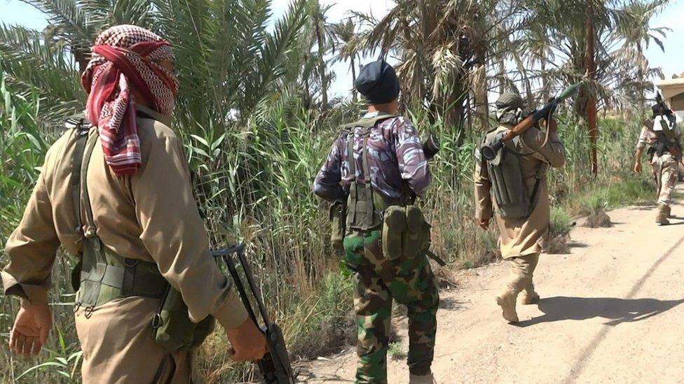 Photo is said to show Islamic State fighters in Falluja, 30 May