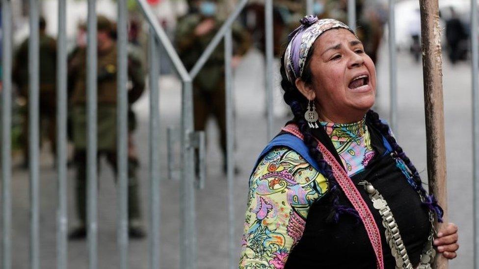 A group of constituents and members of the original peoples of Chile, belonging to the Constitutional Convention, participate in a march from the headquarters of the assembly to the Palacio de la Moneda, in Santiago, Chile, 04 November 2021.