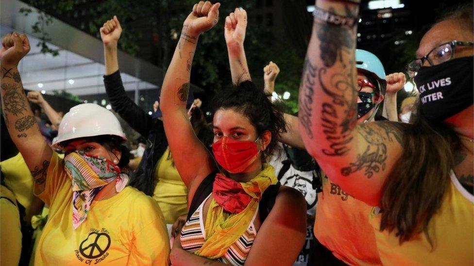 Hundreds of women marched in Portland with raised fists to raise awareness of racial inequality