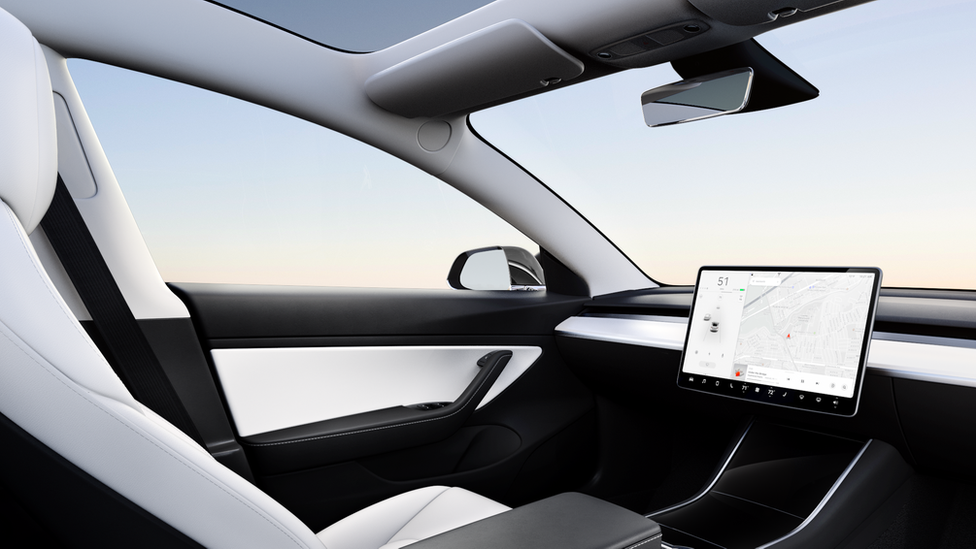 Interior of a model 3 Tesla with no steering wheel