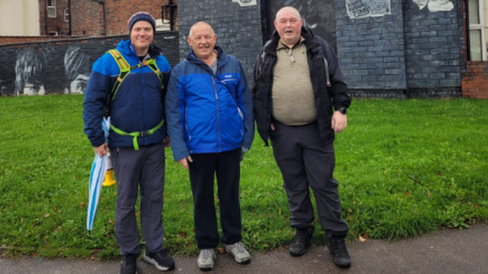 Neil Atherton with two supporters