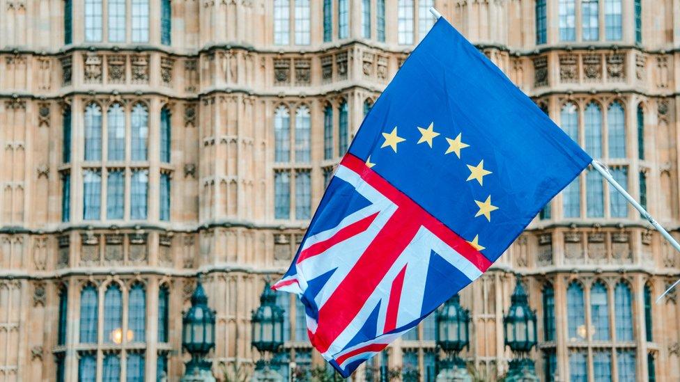 British/EU flag hanging outside the Palace of Westminster