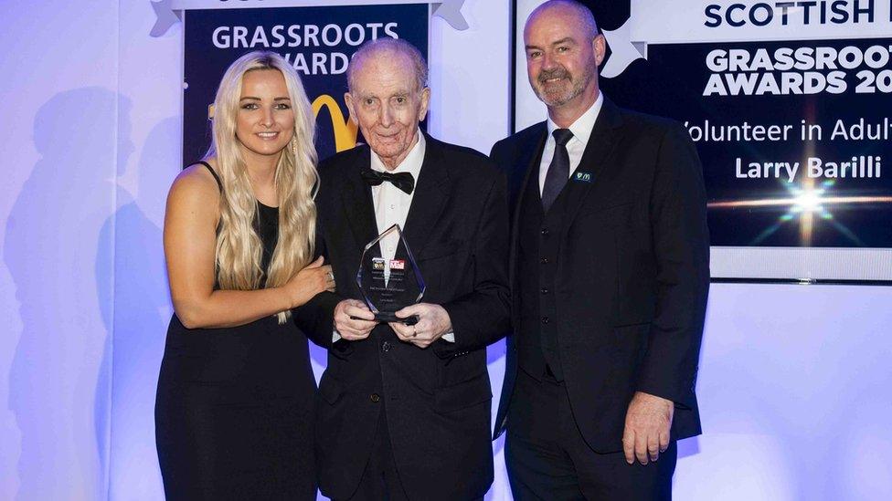 Larry Barilli, pictured with his award along with former Scotland Women’s international Suzanne Winters and Scotland manager Steve Clarke.