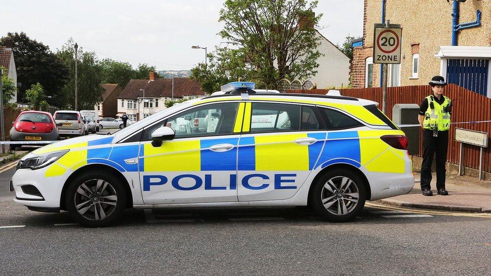 Police officer and car in Preston Gardens, Luton