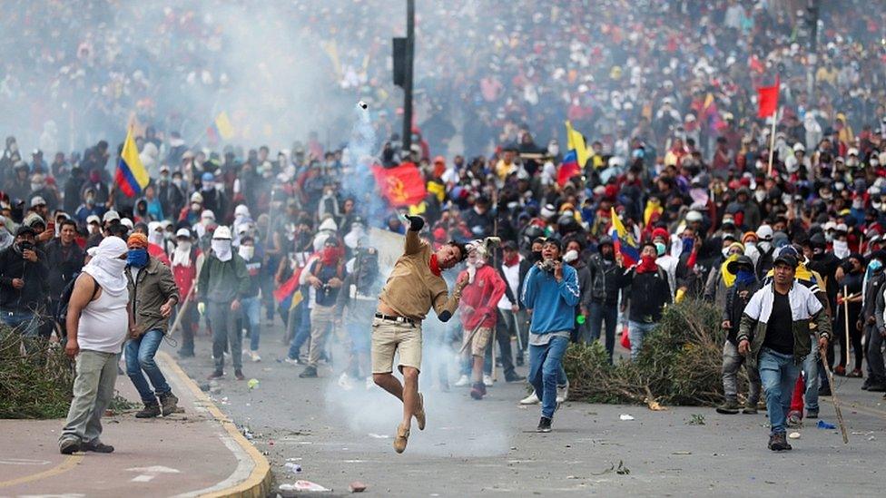 Demonstrators clash with police officers in Quito. 8 Oct 2019