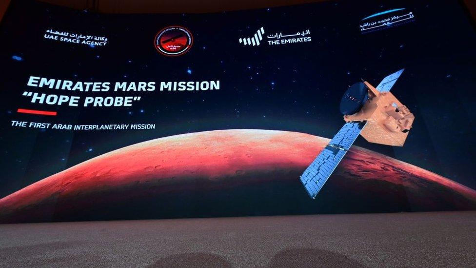 A screen broadcasting the 2020 launch of the "Hope" Mars probe at the Mohammed Bin Rashid Space Centre in Dubai