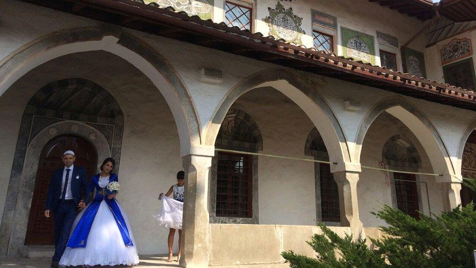 Marlen and Lenora get married at the Great Khan Mosque in Bakhchisaray