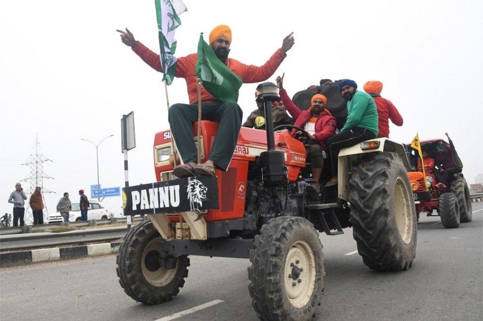 Indian farmers participate in the tractor rally to protest against the government's new agricultural laws at the Kundli Manesar Palwal (KMP) Expressway at Kundli, Haryana state, India, 07 January 2021.