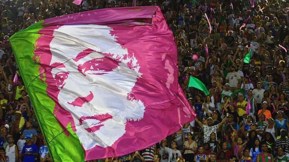 A flag depicting the image of murdered councillor Marielle Franco is seen during the second night of Rio's Carnival parade at the Sambadrome in Rio de Janeiro, on March 5, 2019