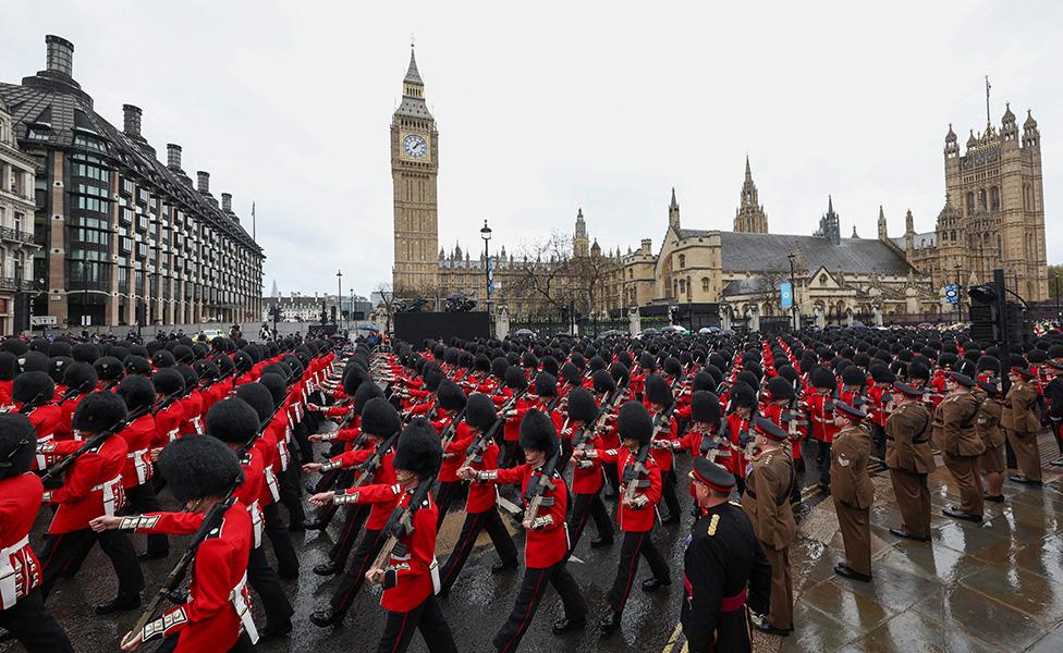 Troops march through Whitehall