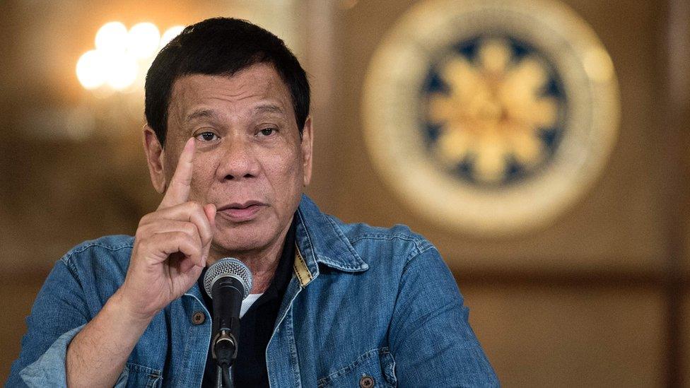 Philippine's President Rodrigo Duterte gestures as he answers a question during a press conference at the Malacanang palace in Manila on 30 January 2017.