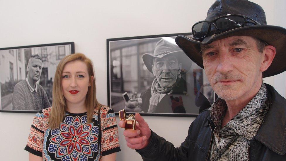 Georgie Hankins with Ambrose in front of his photo