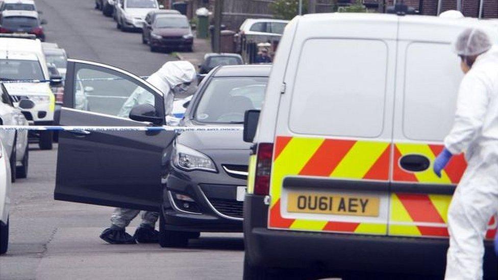 Police at the scene in Luton