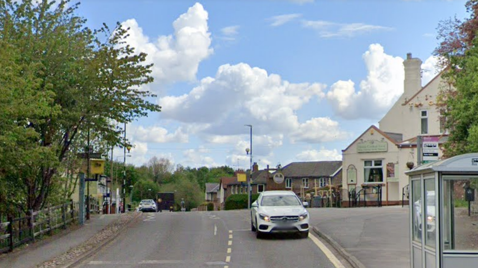 Main Road, with the Gate Hotel visible on the right