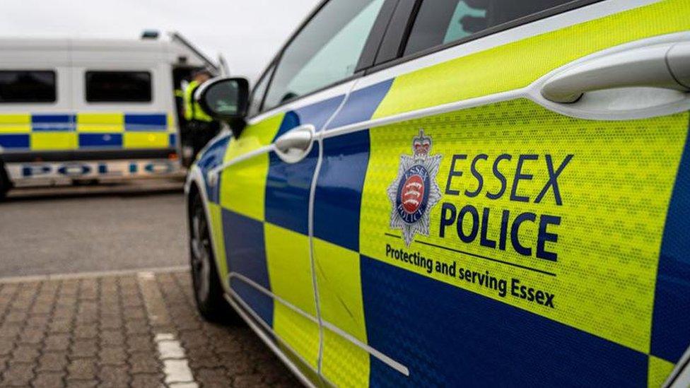 An Essex Police car and van