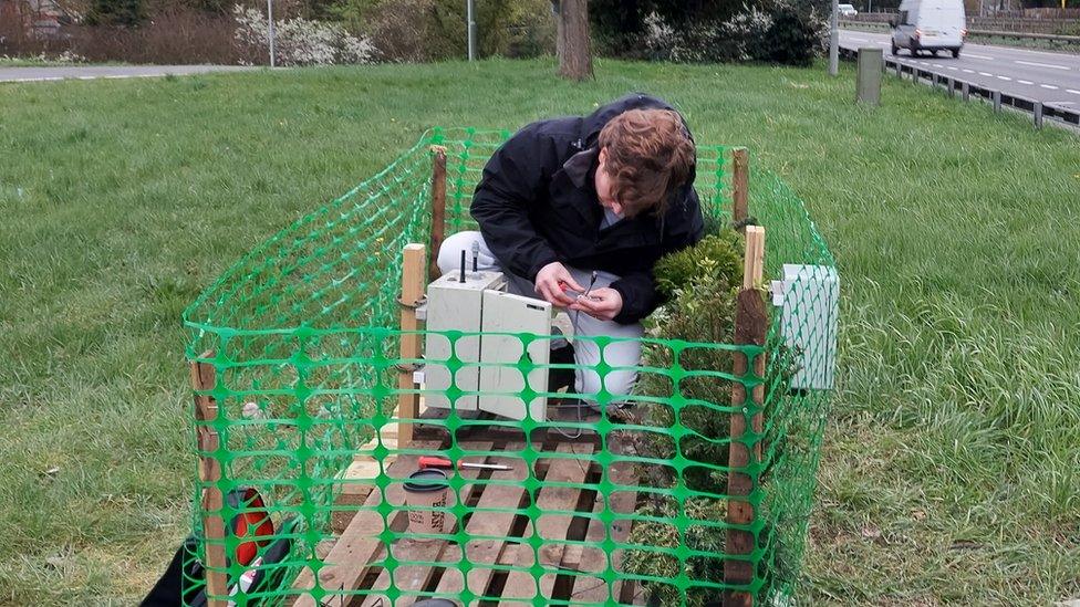 Surrey researcher Yendle Barwise assembling one of the pollution monitors