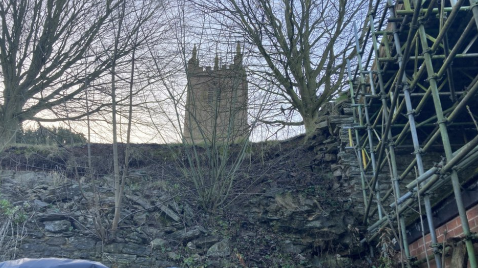 Damaged section of the town wall