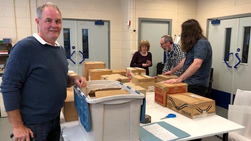 David Cook from Aberdeenshire Council with archive tapes