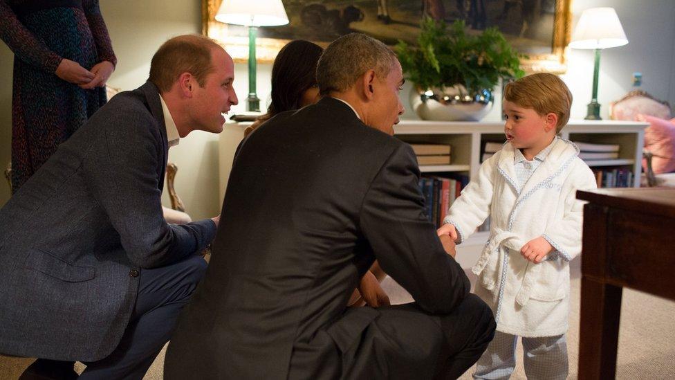 Prince William watching on as Barack Obama shakes Prince Geroge's hand