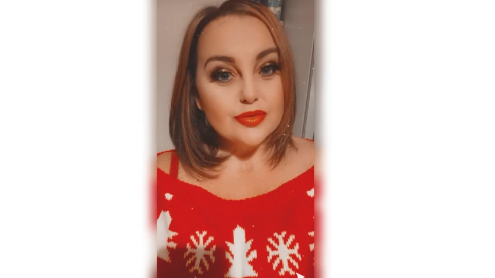 Natasha in make-up and a Christmas jumper