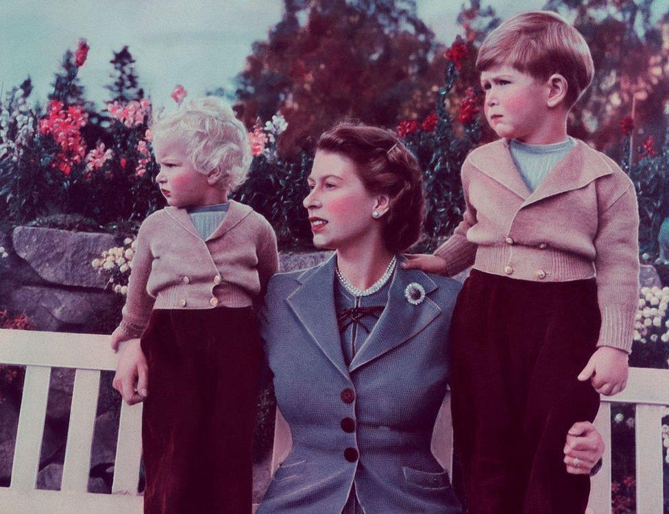 Queen Elizabeth with her children Charles and Anne at Balmoral in 1952