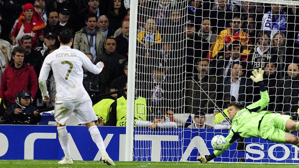 Real Madrid player Ronaldo has his penalty saved by Bayern Munich keeper Manuel Neuer