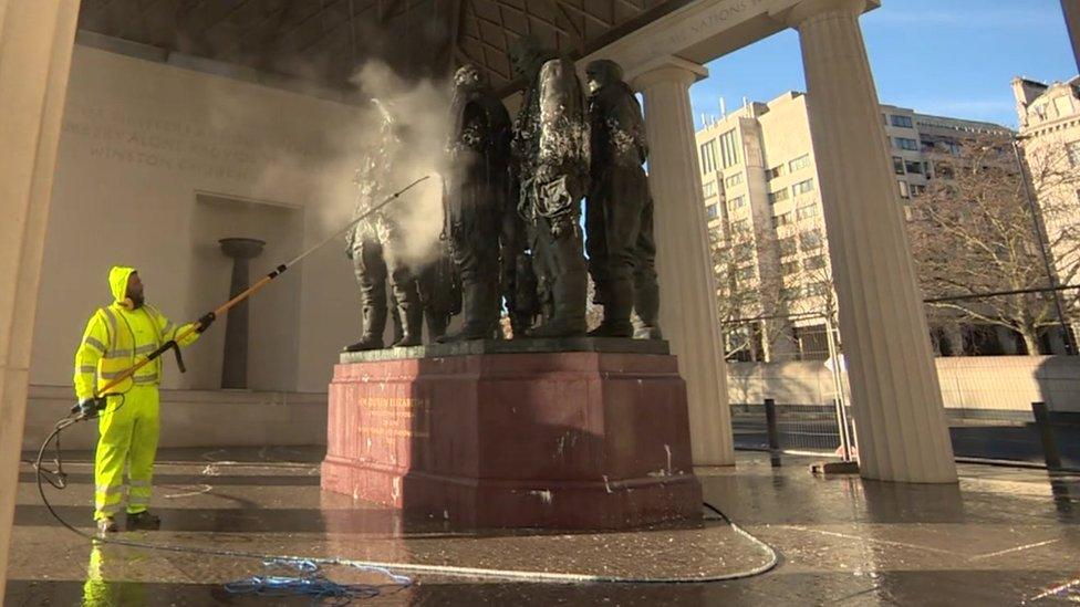 memorial being cleaned