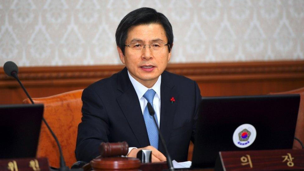 South Korean Prime Minister and acting President Hwang Kyo-Ahn speaks during a cabinet meeting in Seoul, 9 December