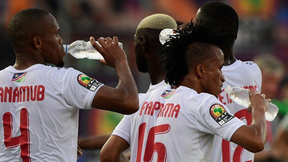 Namibian players drinking water