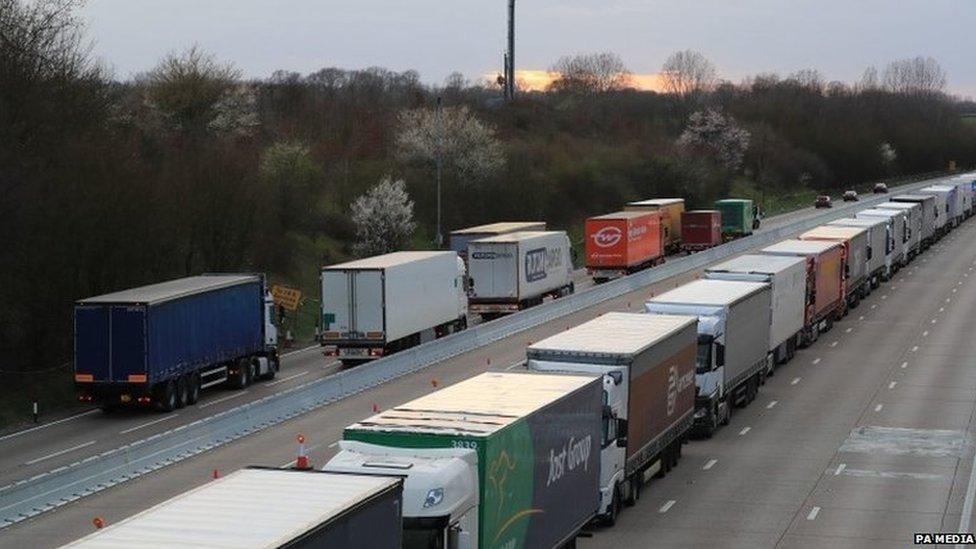 Lorries queue on the A20 outside Dover in Kent where Operation Stack is being implemented