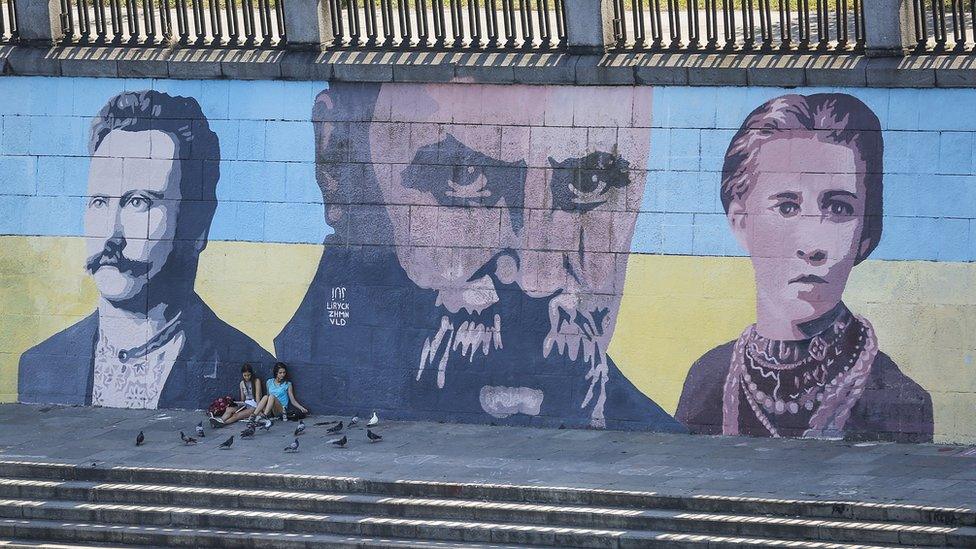 A mural in Kiev with Taras Shavchenko in the centre flanked by fellow poets Ivan Franko and Lesya Ukrainka