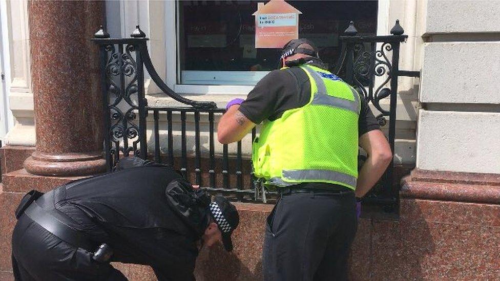 Officers searching for weapons