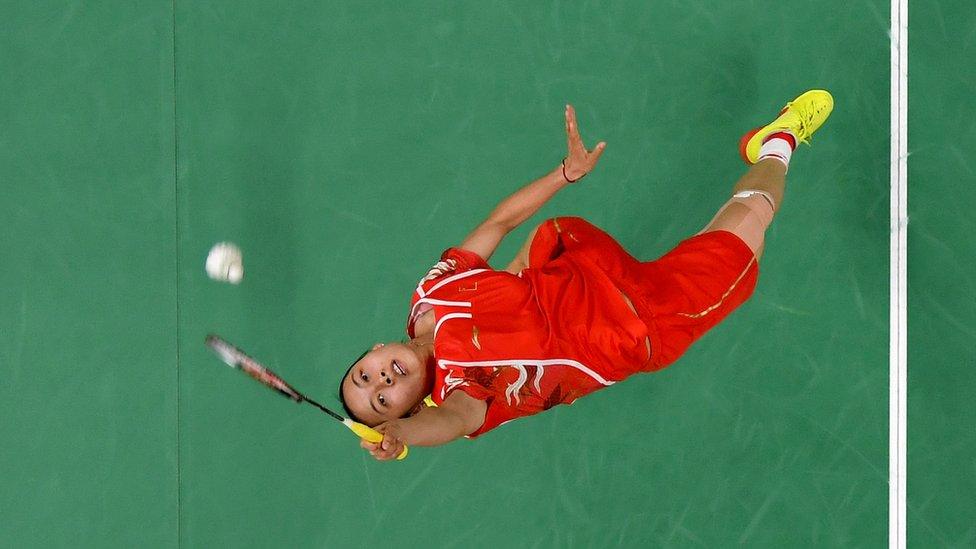 Yihan Wang of China returns a shot to V. Sindhu Pusarla of India on Day 11 of the Rio 2016 Olympic Games at Riocentro