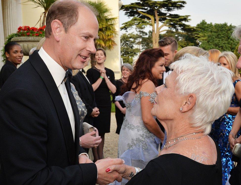 Judi Dench greets the Earl of Wessex