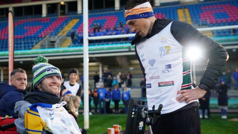 Kevin Sinfield (right) speaks to Rob Burrow