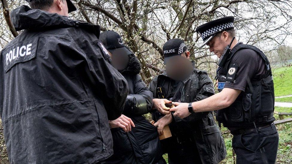 Police officers making an arrest in Harlow