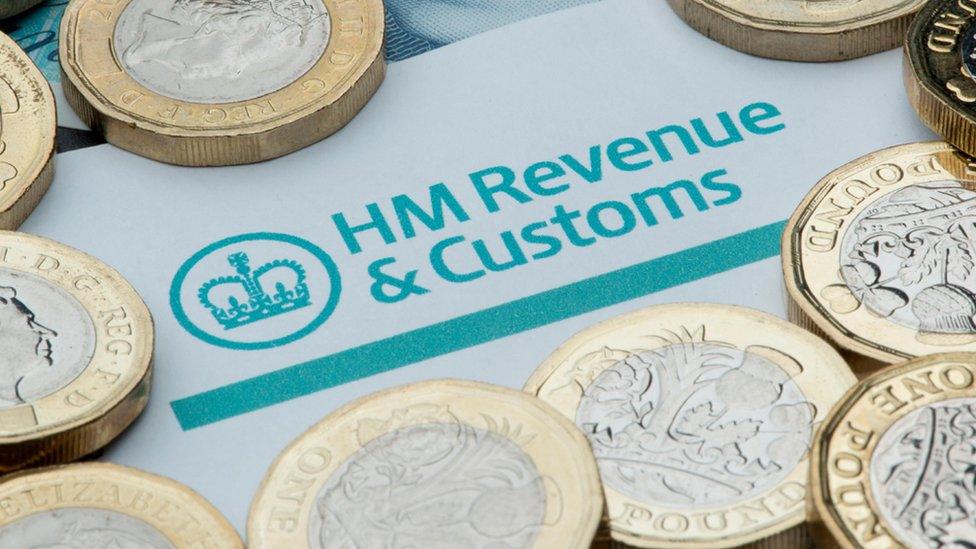 HM Revenue and Customs logo surrounded by coins