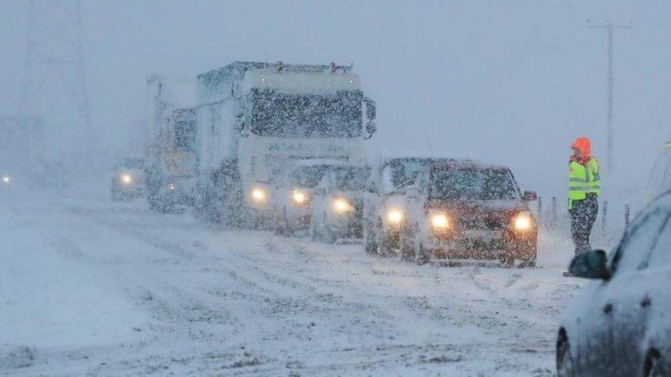 Vehicles in snow in Cumbria