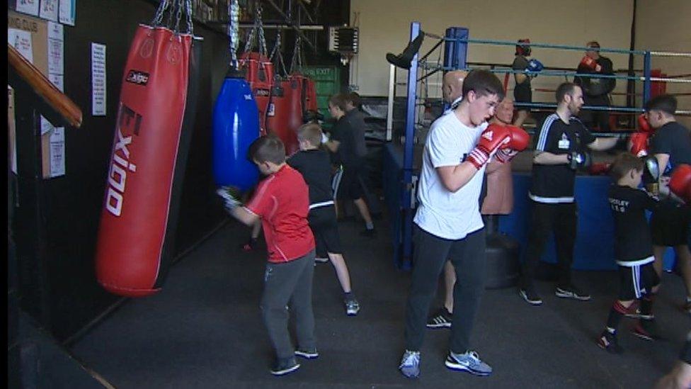 Young people boxing