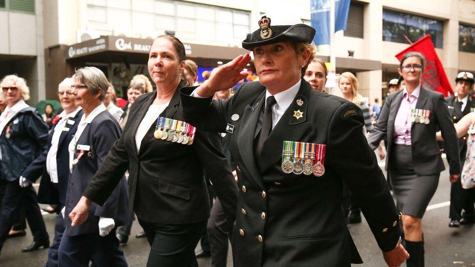 Servicemen make their way down Elizabeth Street during the ANZAC Day parade in Sydney, Australia (25 April 2018)