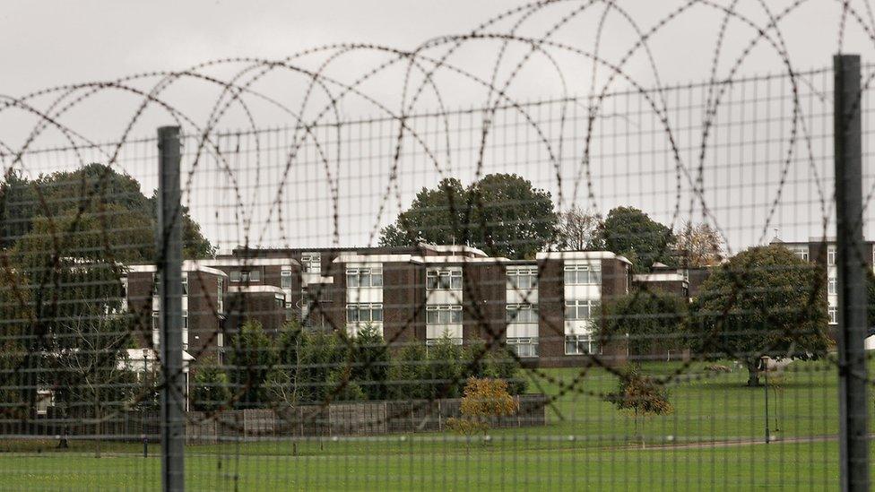 Barb wire surrounds the Defence College of Logistics at Deepcut on October 26, 2005