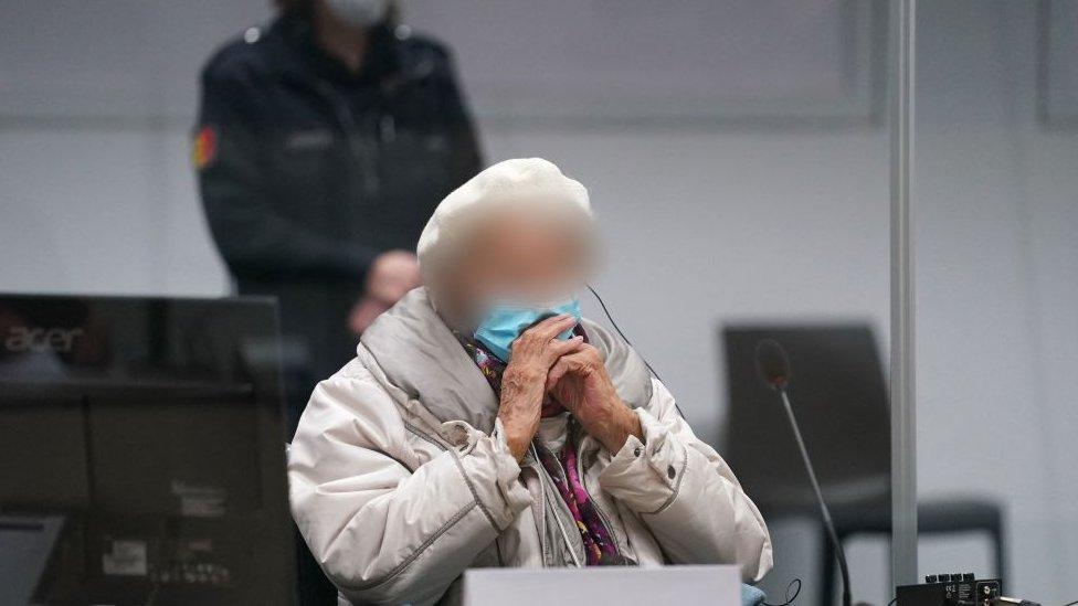 Defendant Irmgard F, a former secretary for the SS commander of the Stutthof concentration camp, waits for the continuation of her trial at court in Itzehoe, northern Germany, on December 6, 2022