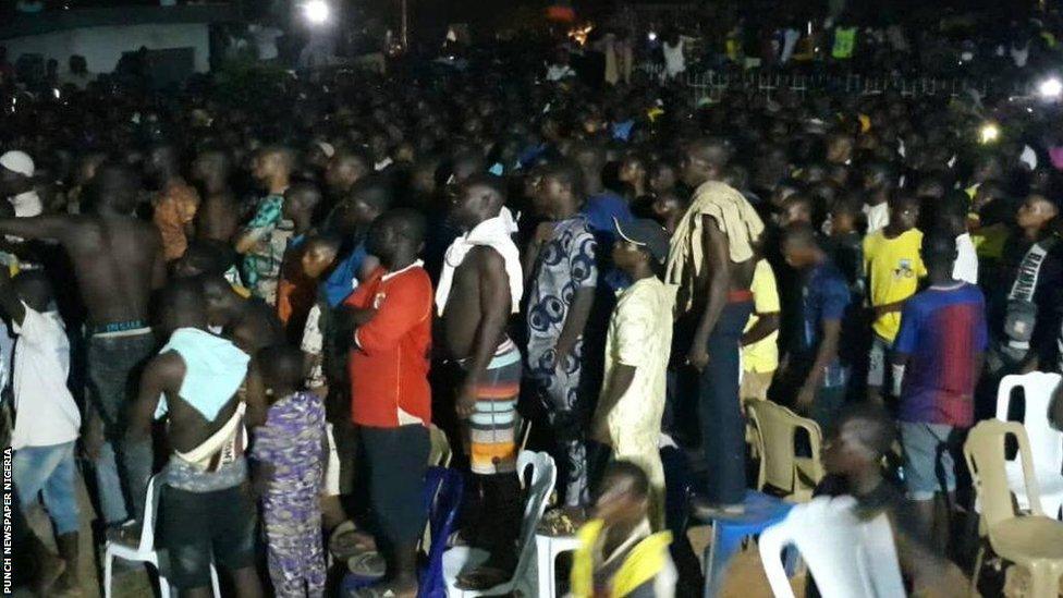 A crowd in the Nigerian town of Sagamu watch Anthony Joshua's second fight against Andy Ruiz Jnr