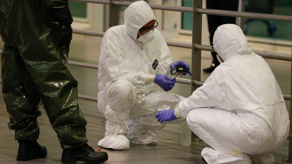 3 A Hazmat (hazardous materials) team conducts checks inside Kuala Lumpur Internatinal Airport 2 (KLIA2) airport terminal at Sepang, Malaysia, 26 February 20